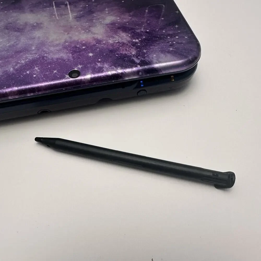 Nintendo New 3DS XL Purple Galaxy Edition - Charger, Stylus, Manual & 4 Games
